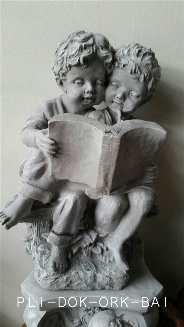 ตุ๊กตาปูนเด็กอ่านหนังสือแต่งสวน
